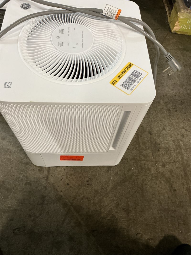 Condition photo showing As Is for 50 pt. for wet rooms up to 5000 sq. ft. residential dehumidifier with built-in. pump in white, wi-fi, energy star