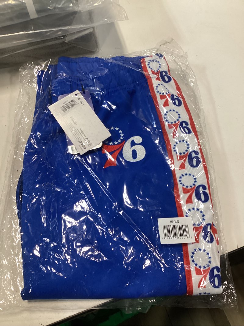 Condition photo showing New/Like New for FOCO NBA Mens NBA Team Color Stripe Logo Track Suit Pants Philadelphia 76ers Medium Team Color