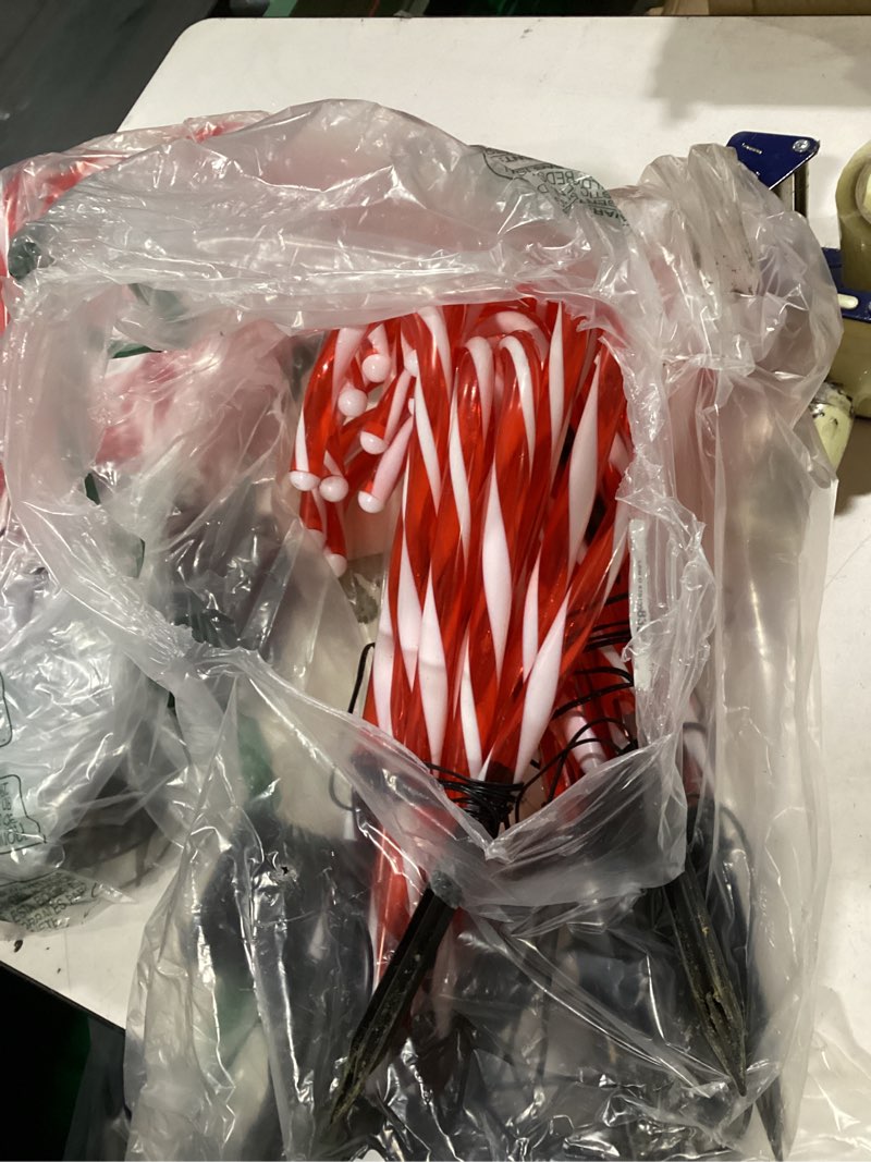 Condition photo showing As Is for christmas candy cane pathway markers lights, candy canes lights outdoor, 10 inch set of 10 pack christmas candy cane lights decorations yard candy cane pathway lights, lighted candy cane decor garden