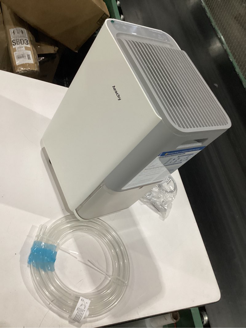 Condition photo showing New/Like New for aeocky 2800 sq.ft dehumidifier with drain hose, 40 pint/d compressor dehumidifier for home, bathroom, bedroom, basement, 0.5 gallon water tank capacity, intelligent humidistat, quiet