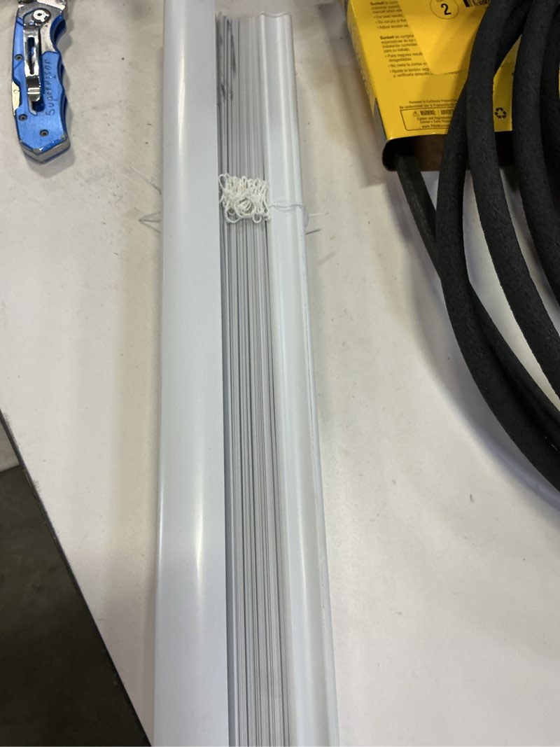 Condition photo showing As Is for magne blind 1-in slat width 25-in x 42-in cordless white vinyl room darkening half-view standard mini blinds