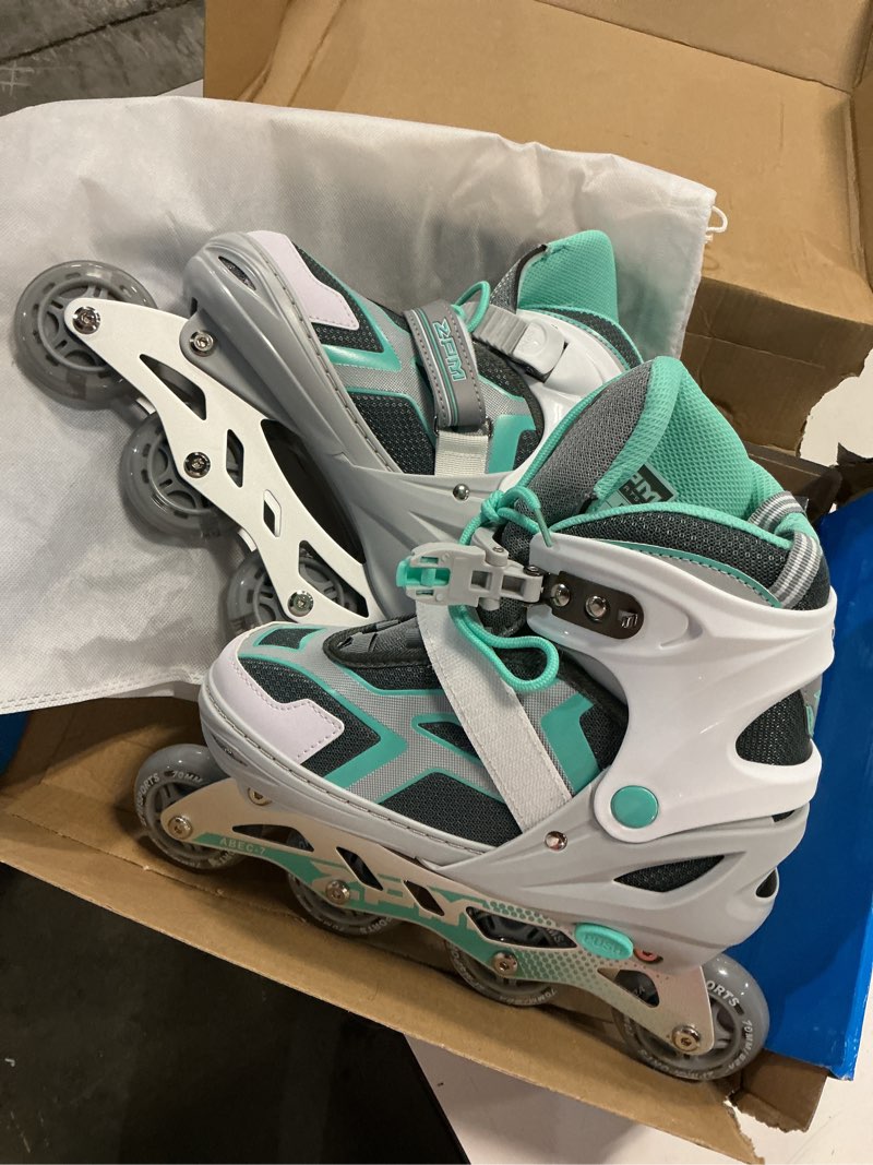 Condition photo showing New/Like New for 2pm sports torinx green boys adjustable inline skates, fun beginner roller skates for kids, youth, girls, men and women g teal large - youth (4-7 us)