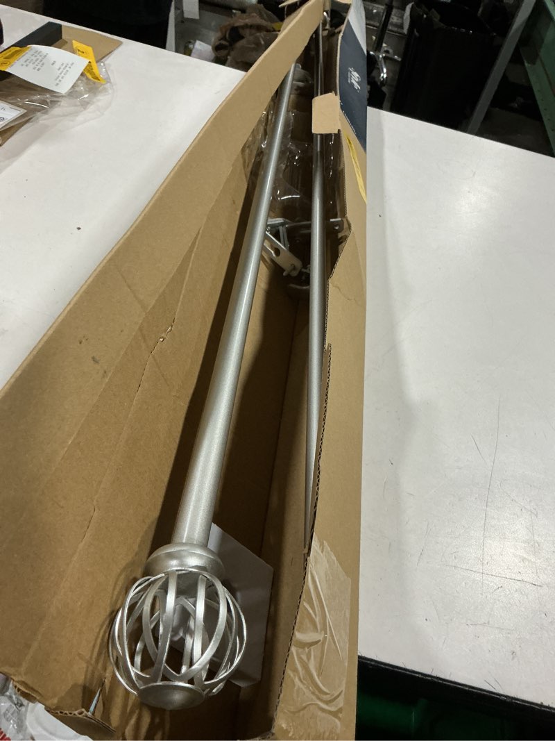 Condition photo showing As Is for style selections florine 48-in to 84-in brushed nickel steel single curtain rod with finials