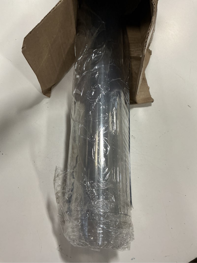 Condition photo showing item condition for OstepDecor Clear Table Protector 2mm Thick, 40 x 78 Inch Plastic Table Cover, Table Protector for Dining Room Table, Clear PVC Tablecloth Protector, Vinyl Desk Pad Mat for Writing Desk, Dresser 40 x 78 Inches Crystal Clear 2mm