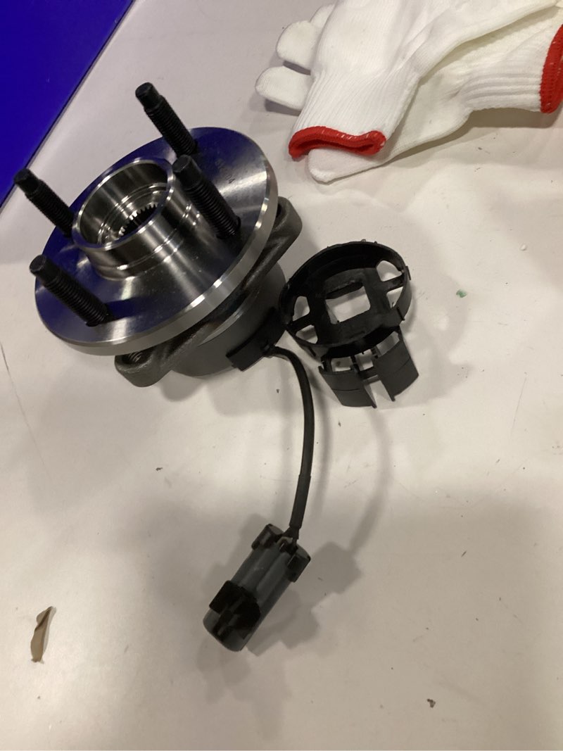 Condition photo showing As Is for front wheel hub bearing assembly