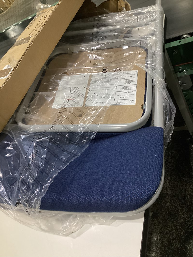 Condition photo showing Good Condition for Flash Furniture 4 Pack HERCULES Series Premium Curved Triple Braced & Double Hinged Navy Fabric Metal Folding Chair Navy Set of 4