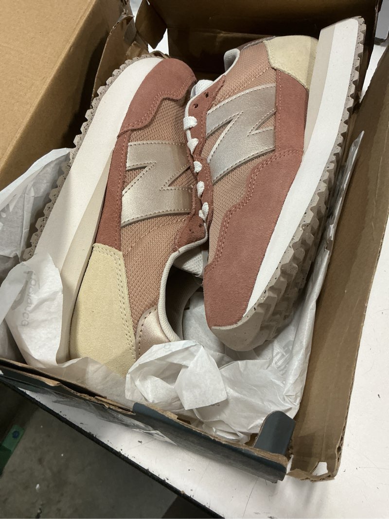 Condition photo showing New/Like New for new balance women's 237 v1 sneaker copper/copper 6.5