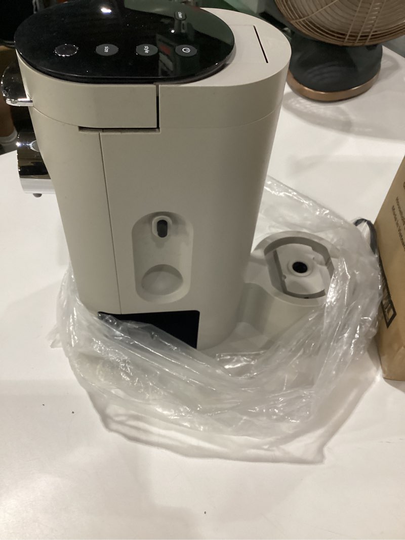 Condition photo showing As Is for ninja pods & grounds single-serve coffee maker, k-cup pod compatible, brews grounds, compact design, 56-oz. reservoir, 6-oz. cup to 24-oz. travel mug brew sizes, iced coffee maker, stone, pb041st, not tested, incomplete