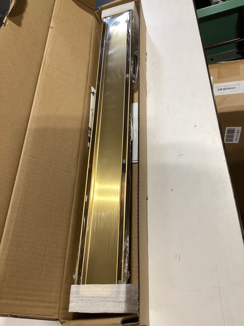 Condition photo showing Good Condition for gold shower drain, 24 inch linear shower drain with removable tile insert grate, 2 in 1 bathroom modern 304 stainless steel brushed gold shower floor drain with adjustable feet,hair strainer brushed gold 24in