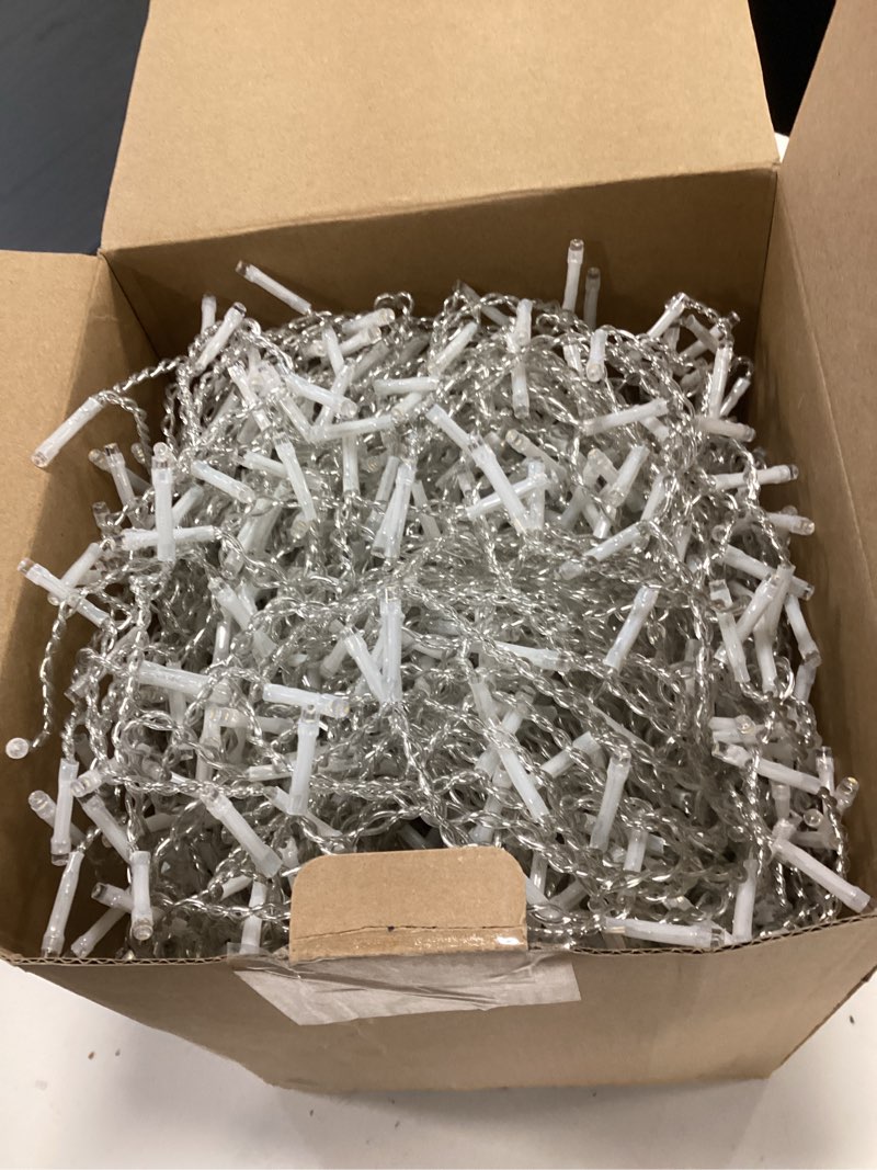 Condition photo showing As Is for (Similar) kemooie 400 LED Outdoor Curtain Lights, 26.2FT x 3.3FT Curtain String Lights with 8 Shining Modes for Indoor Ceremony Birthday Christmas Party Bedroom Balcony Roof Decorations (Warm White)