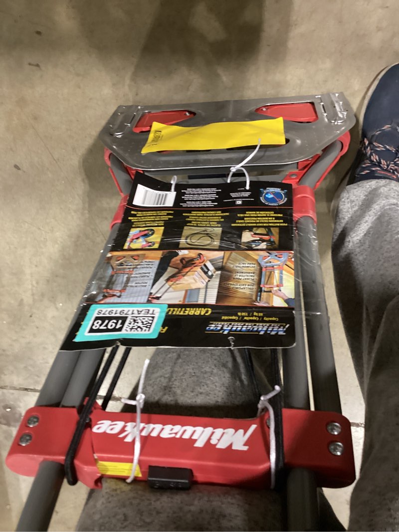 Milwaukee 150-lb Capacity 2 -Wheel Red Steel Folding hand truck has cracks 
