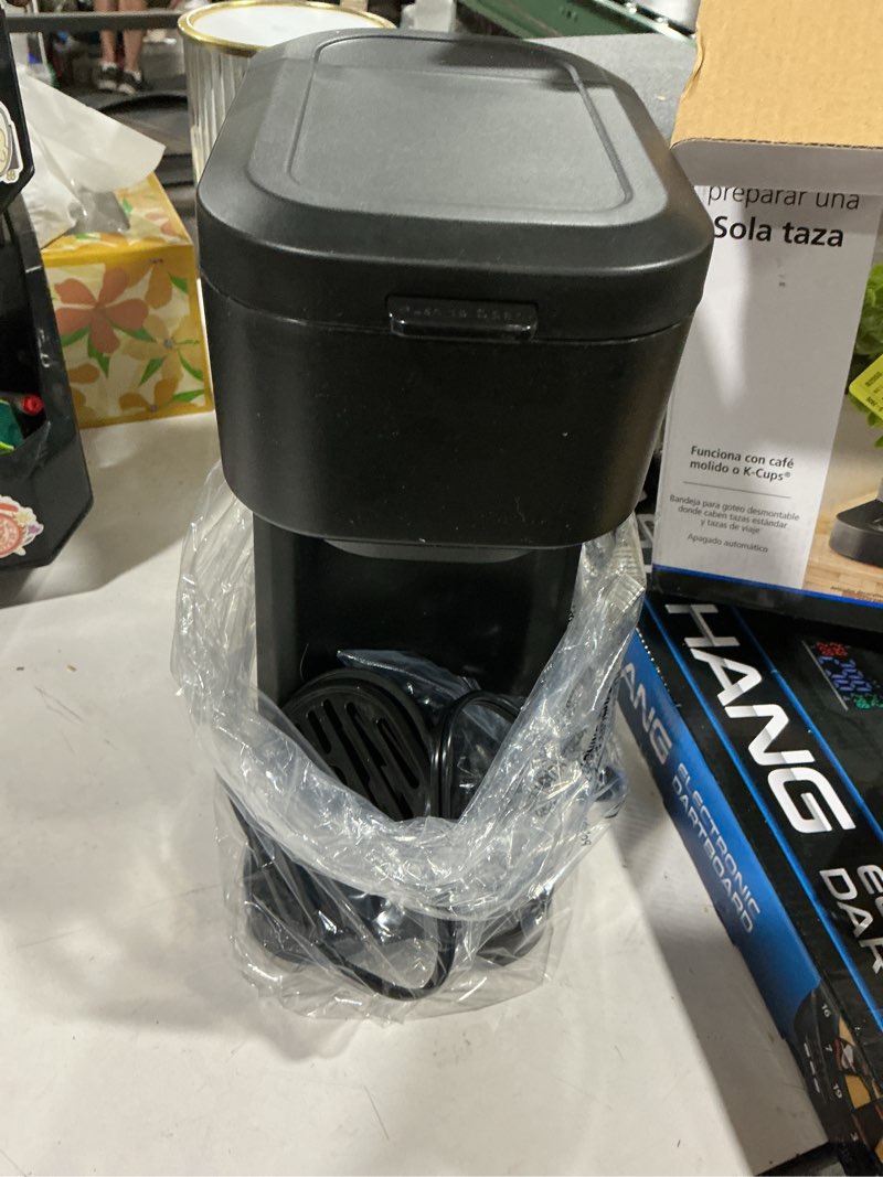 Condition photo showing As Is for mainstays black matte dual brew coffee maker, single serve, auto shutoff, 14 oz reservoir