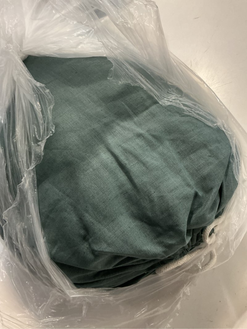 Condition photo showing As Is for european linen duvet cover, king/cal king, ocean