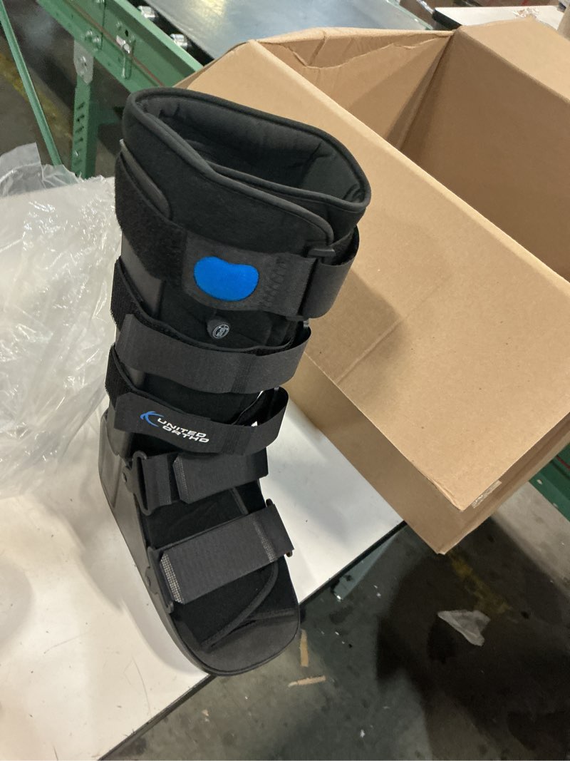 Condition photo showing New/Like New for united ortho usa14107 air cam walker fracture boot, large, black large (pack of 1) black