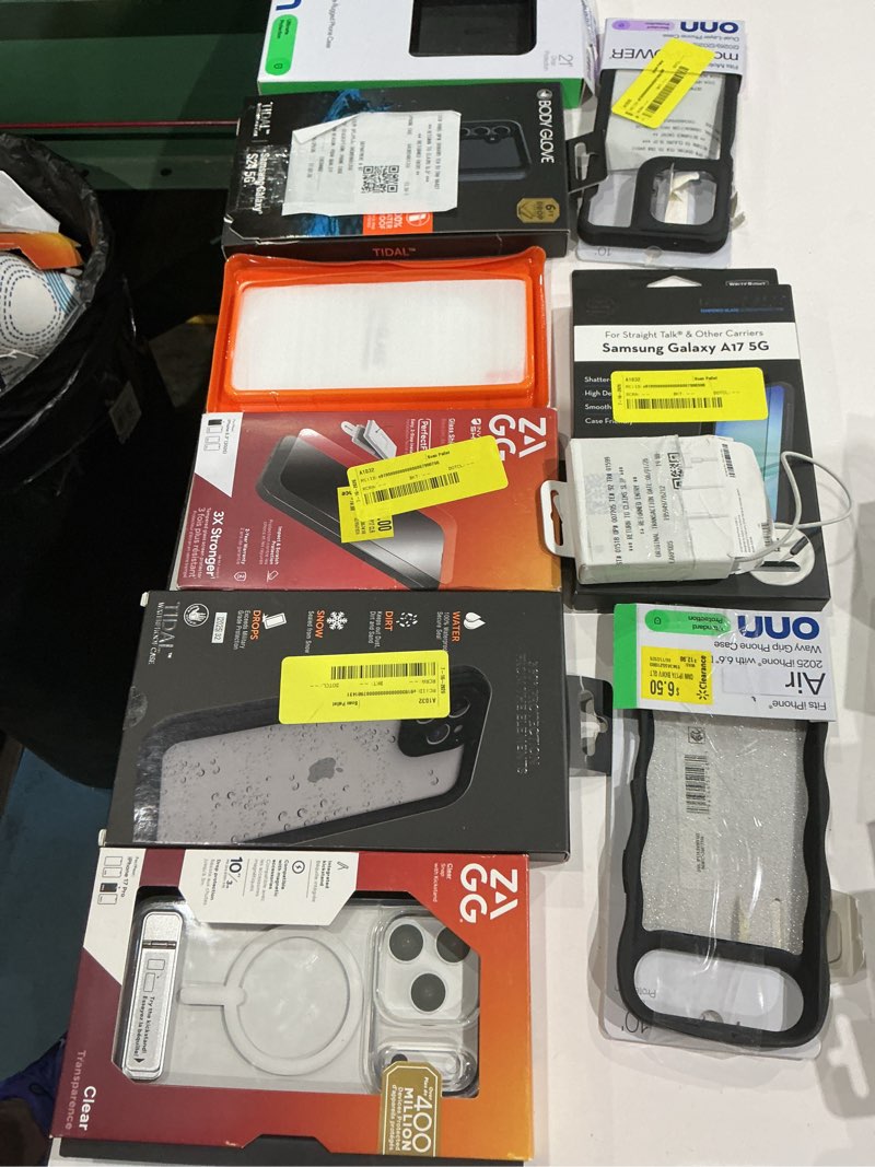 Condition photo showing As Is for assorted cellphone/tablet/laptop case covers & accessories