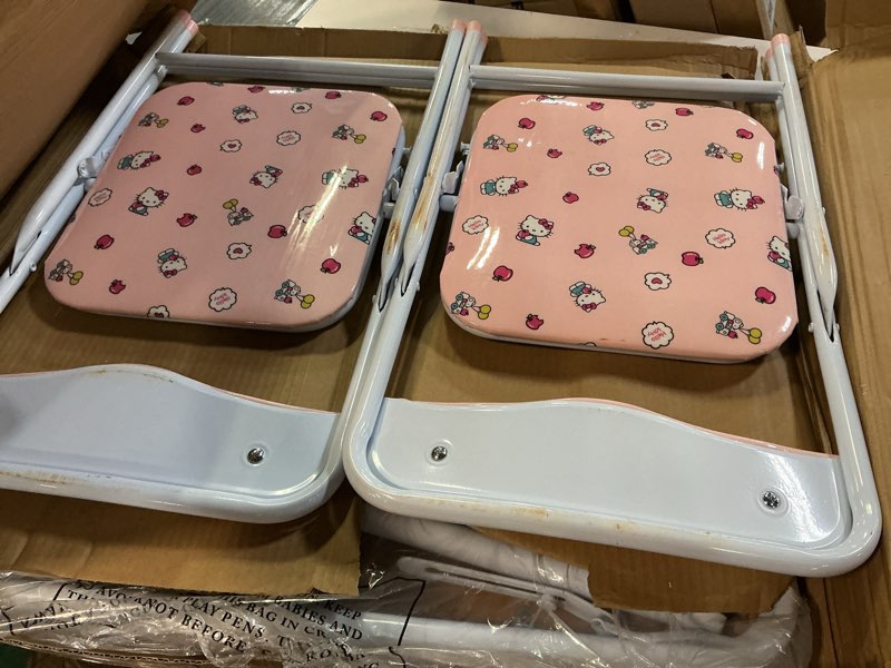 Condition photo showing Good Condition for hello kitty kids' 3-piece table and chairs set, pink