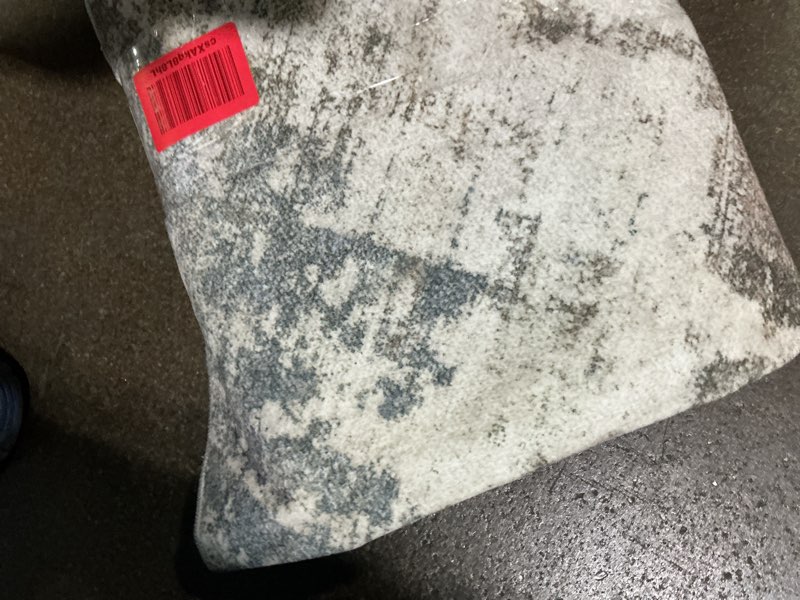 Condition photo showing As Is for mohawk home cassandra abstract ornamental denim blue 7' 10" x 10' area rug perfect for living room, dining room, office 7'10" x 10' (rectangular) cassandra denim blue