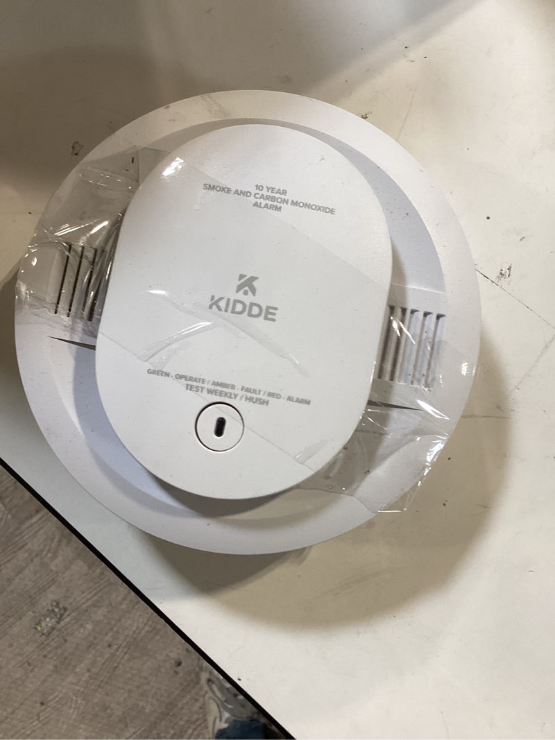 Condition photo showing As Is for kidde, 20sar, hardwired smoke detector, aa battery backup, interconnectable, led warning light indicators 1 pack 9th edition 20sar