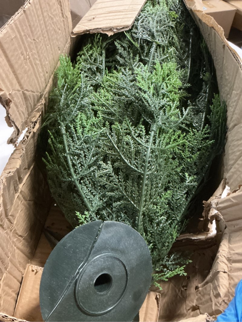 Condition photo showing As Is for nearly natural 3ft. uv resistant artificial cedar bush with integrated ground stake (indoor/outdoor)