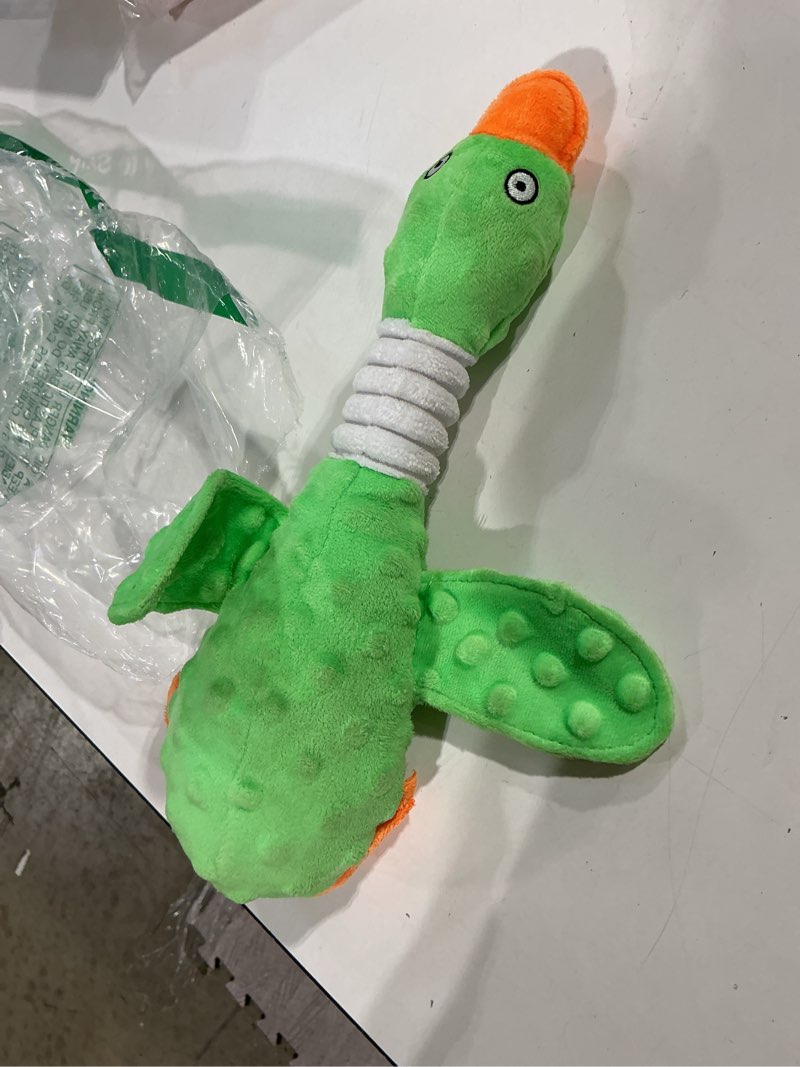 Condition photo showing Good Condition for squeaky dog toys for aggressive chewers, durable stuffed animal plush dog toy with soft fabric for large, medium & small dogs, interactive puppy chew toy for teething, crinkle duck dog toy - green