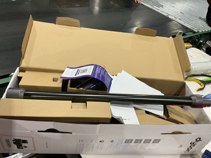 Condition photo showing As Is for dyson v8 cordless stick vacuum cleaner demage