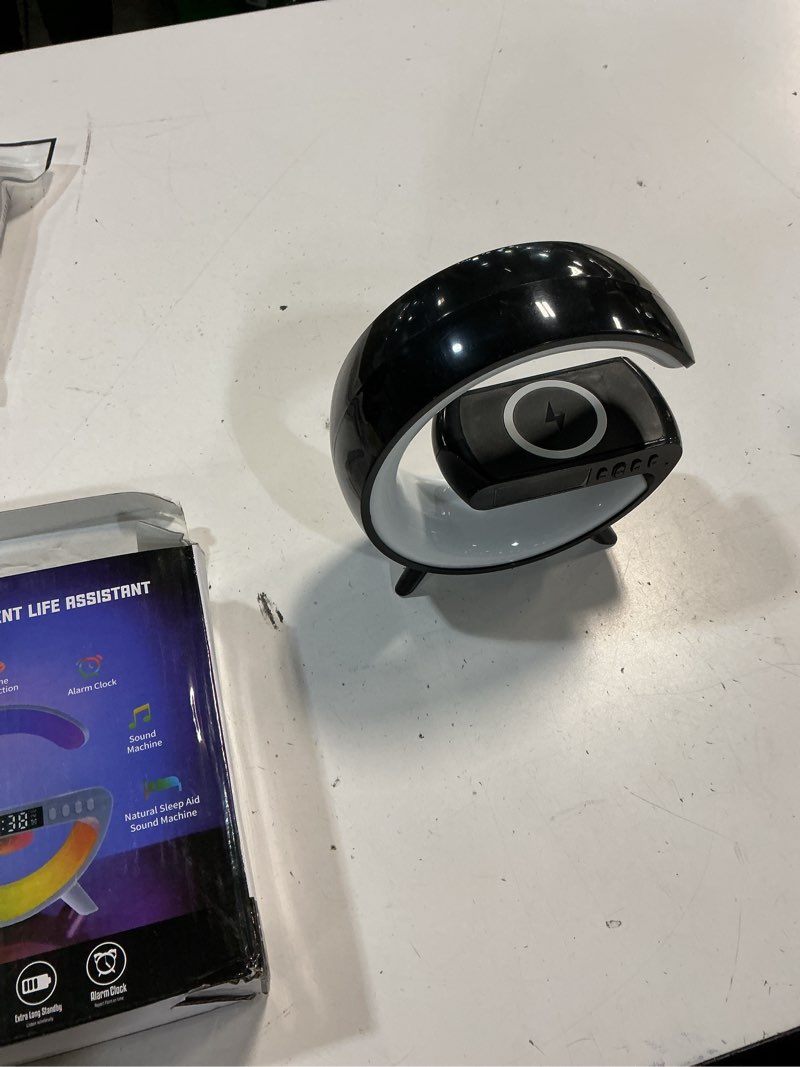 Condition photo showing Good Condition for led table lamp with wireless charger, g shaped night light lamp with bluetooth speaker, sunrise alarm clock, smart mini atmosphere lamp for bedroom, office, living area (white) (color may vary ours is black)