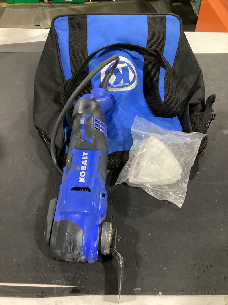 Condition photo showing As Is for  kobalt 4 -amp variable speed 28 -piece oscillating multi-tool with soft model #k4mt-03