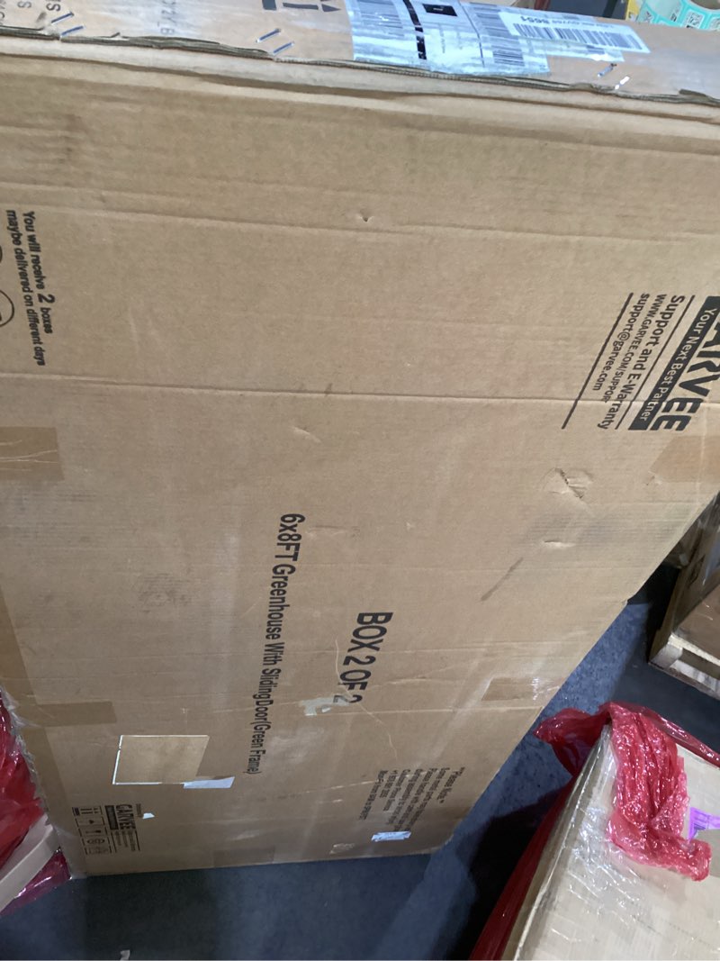 Condition photo showing As Is for incomplete  missing  box 1 of 2 *garveetech 6x10 ft greenhouse, polycarbonate garden greenhouse for outdoors,aluminum frame green house with lockable door and adjustable roof vent, ideal for backyard patio and outside growing green 6×10 ft