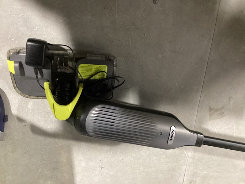 Condition photo showing As Is for Shark VACMOP Cordless Hard Floor Cleaner, Vacuum and Spray Mop, Powerful Suction, Lightweight, LED Headlights, Includes 4 Disposable Pads, 12oz Multi-Surface Cleaning Solution, Gray, VM252