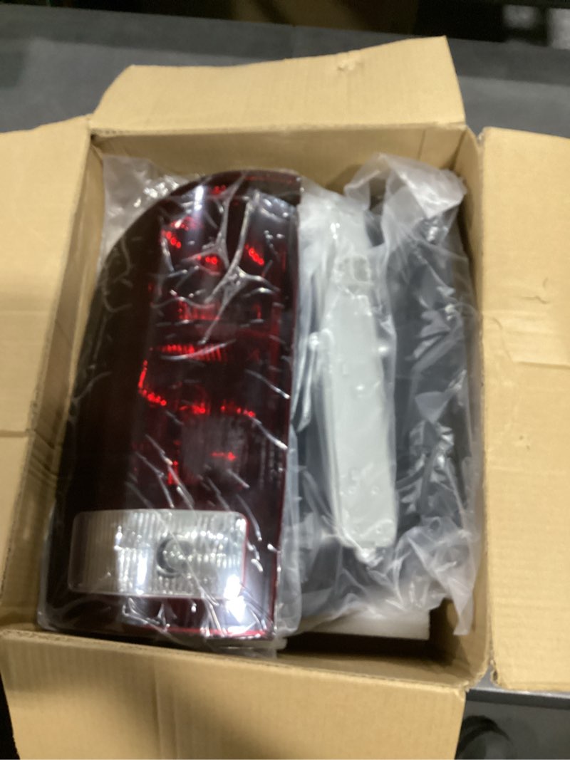 Condition photo showing Good Condition for tail light compatible with 2002-2006 dodge ram 1500 2500 3500 pickups rear brake lamp with circuit boards (smoke red lens)