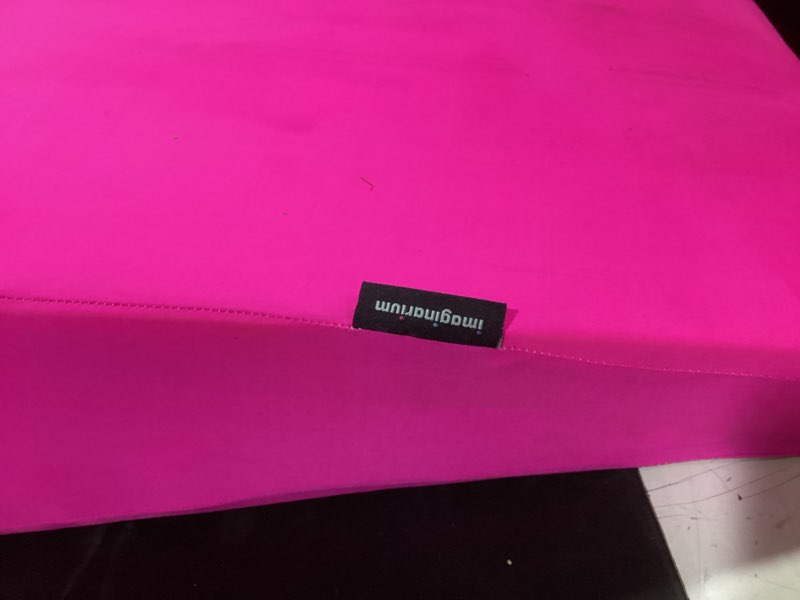 Condition photo showing As Is for imaginarium fun pillow® wedge with memory foam top layer, party pink