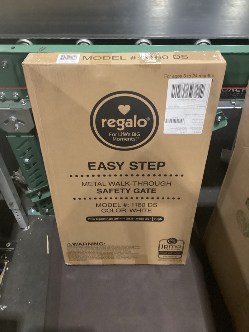 Condition photo showing New/Like New for regalo safety 29-38.5" baby gate for doorways & bottom of stairs, pressure mounted baby gate with door for babies, toddlers & pets, tested & safe for 30 years, american designed, american owned, white white 29-38.5"w x 30"h