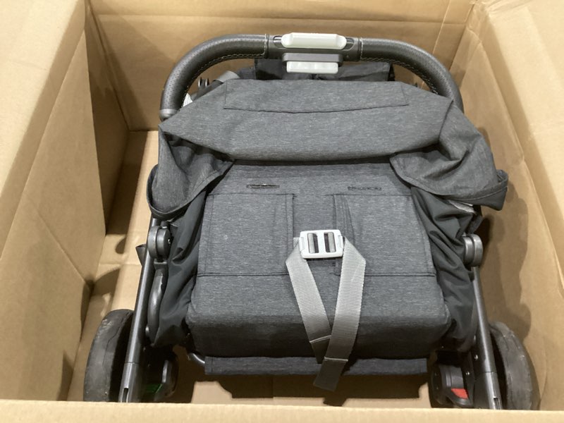 Condition photo showing As Is for uppababy minu v3 travel stroller | lightweight + compact design | one-hand fold + unfold | from birth + overhead compatible | jake (charcoal/carbon frame/black leather)