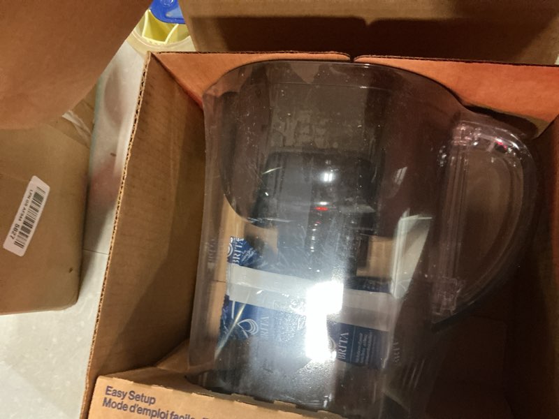 Condition photo showing As Is for brita large 10-cup elite water filter pitcher, wqa nsf/ansi certified, reduces 99% of lead, microplastics, & 30 contaminants, bpa-free, removes chlorine taste & odor, 1 elite filter, black 10 cup black