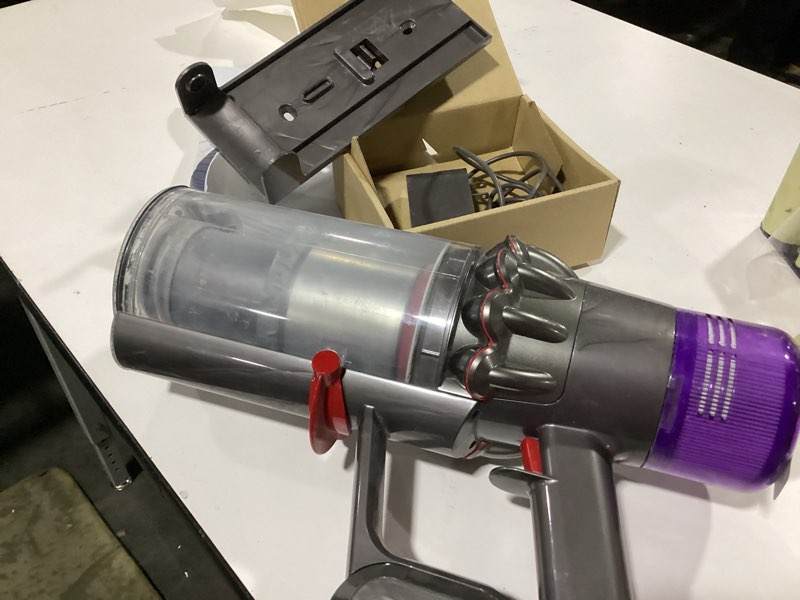 Condition photo showing As Is for **AS IS**Dyson V9 Motorbar Cordless Vacuum, Cleans Hard Floors and Carpets, Detangles, Converts to Handheld, 100AW, 3 Power Modes, Up to 40 Minutes¹