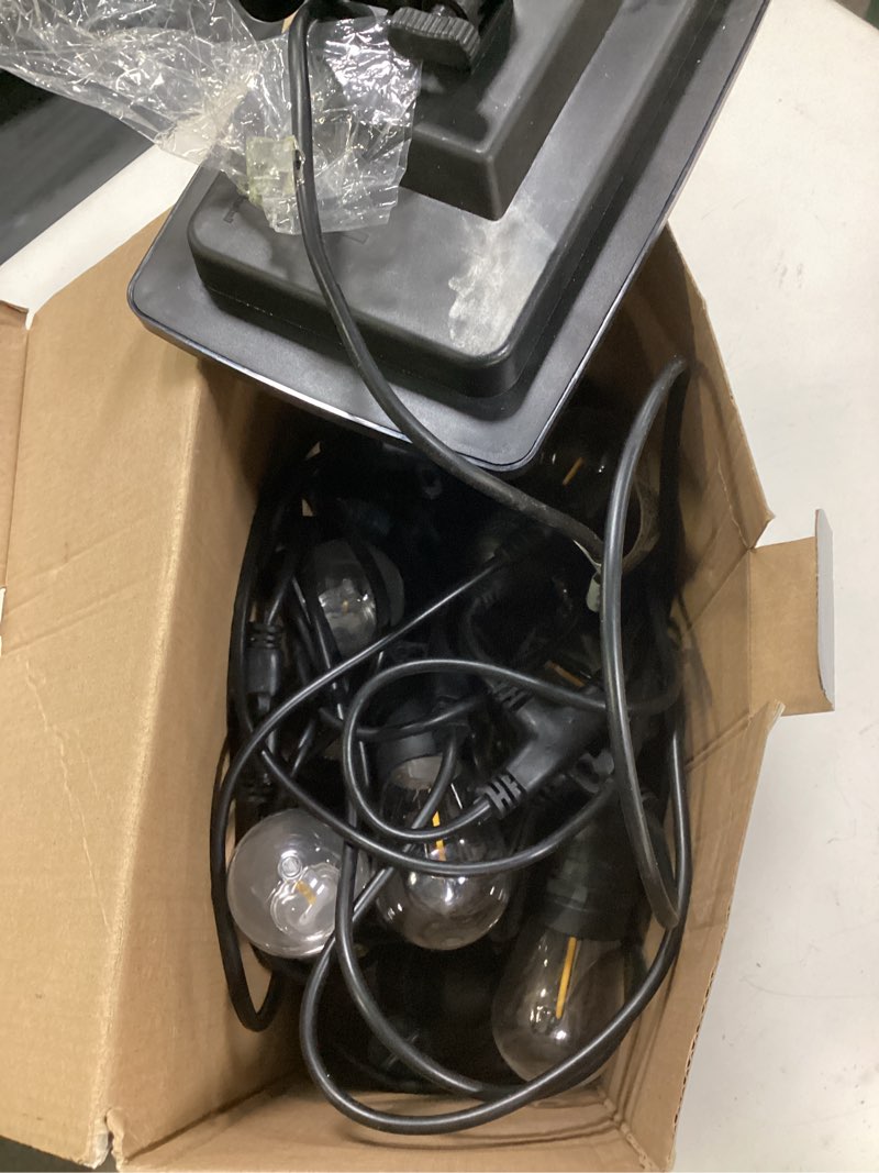 Condition photo showing As Is for harbor breeze 48-ft solar black indoor/outdoor string light with 20 white -light led edison bulbs
