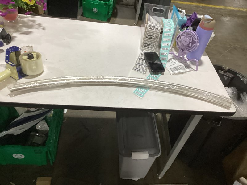 Condition photo showing As Is for curved adjustable 55 in. - 72 in. shower rod in satin nickel missing hardware