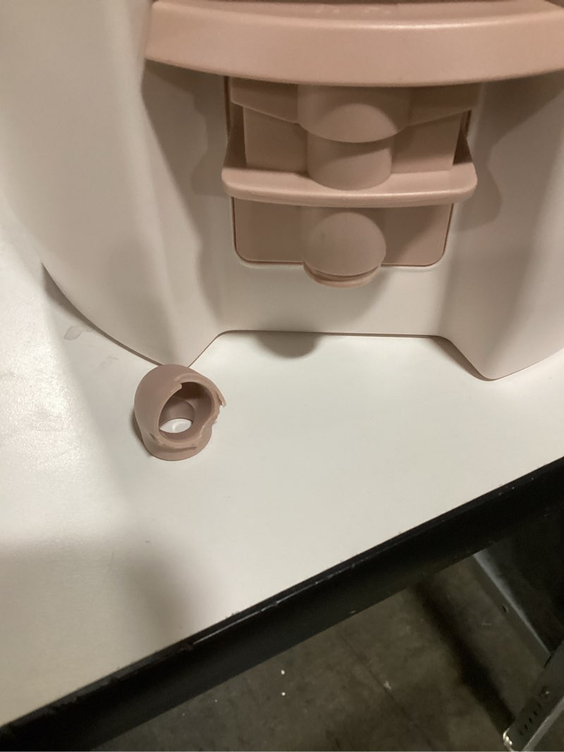 Condition photo showing As Is for **as is** (broken spout) STANLEY Adventure Fast Flow Water Jug 2 Gallon Leakproof Ice Water Dispenser Insulated Beverage Cooler Easy Pour Spigot and Latched Foam Lid BPA-Free Rose Quartz