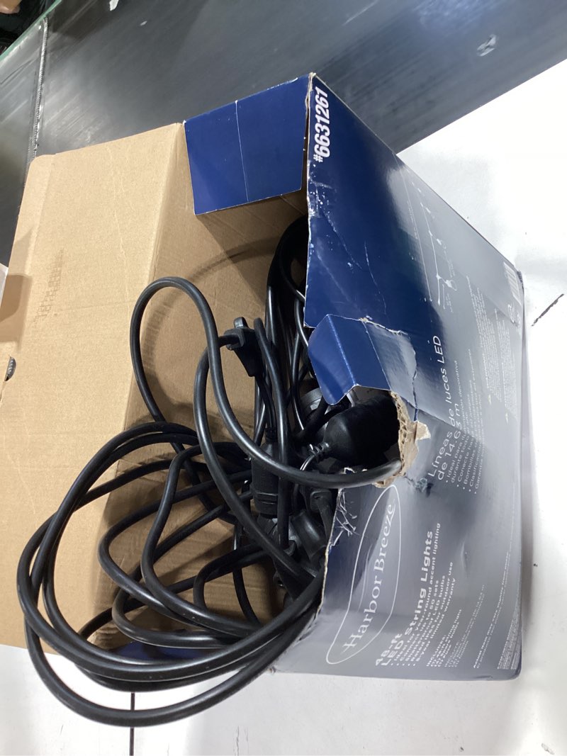 Condition photo showing As Is for harbor breeze 48-ft plug-in black indoor/outdoor string light with 24 white -light led edison bulbs