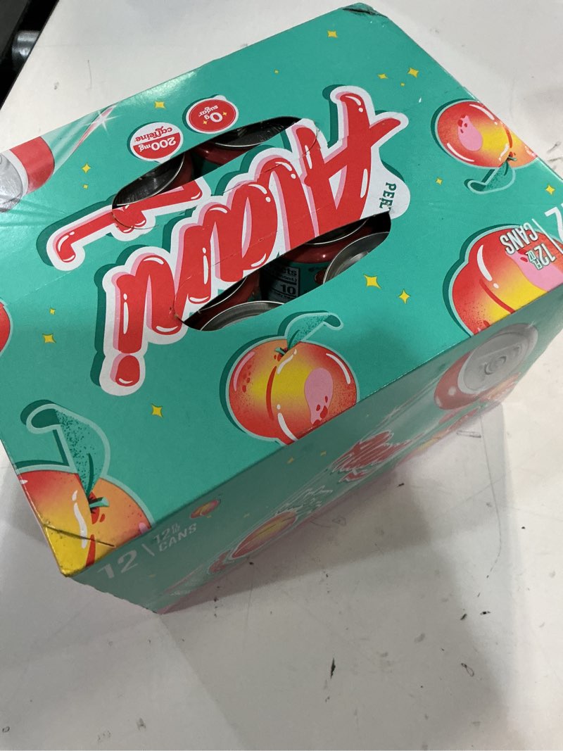 Condition photo showing New/Like New for (BB:12/2027)Alani Nu JUICY PEACH, Sugar Free, Low Calorie Energy Drinks, 200mg Caffeine, Biotin, B Vitamins, Zero Sugar, 10 Calories, 12 Fl Oz Cans, 12 Pack Juicy Peach 12 Fl Oz (Pack of 12)