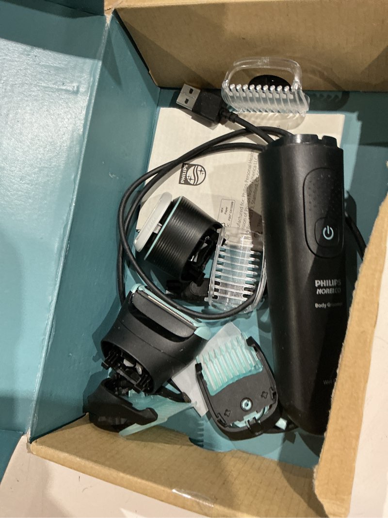 Condition photo showing As Is for philips norelco body groomer 5000 series, intimate hair trimmer & shaver for men with dual 100% showerproof full body shave & trim heads and two bi-directional body hair combs, bg5495/50 black bg5495/50 + 6 accessories