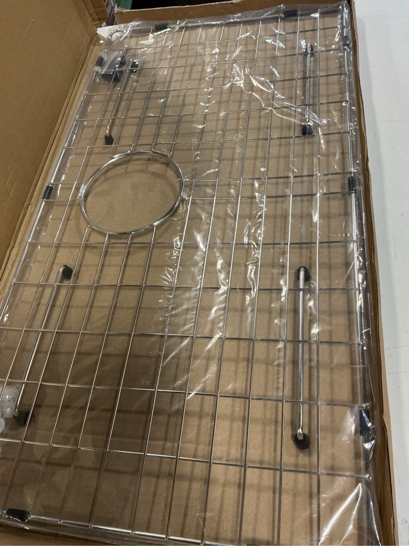 Condition photo showing Good Condition for 27-9/16" x 14-9/16" Sink Protector, Rear Drain with Corner Radius 3/16", Sink Grid - Rear Drain for Single Bowl Kitchen Sinks 27-9/16" x 14-9/16 Rear Drain