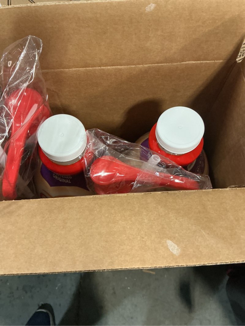 Condition photo showing New/Like New for best by 05/2026 coffee mate sweetened original 2/50.7 fl oz bottles