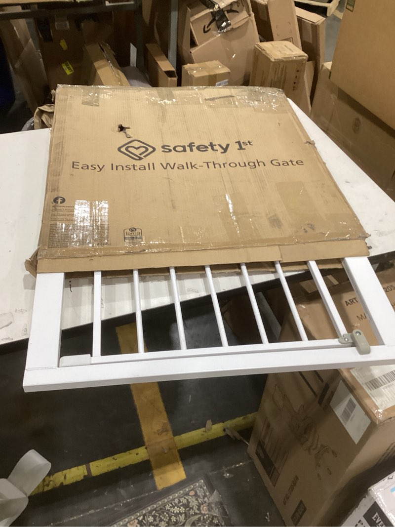 Condition photo showing Good Condition for safety 1st easy install walk thru baby gate for doorway with door, dog gates, fits 29"-38", easy install 28" tall, white 1-pack 29" to 38" wide x 28" tall white