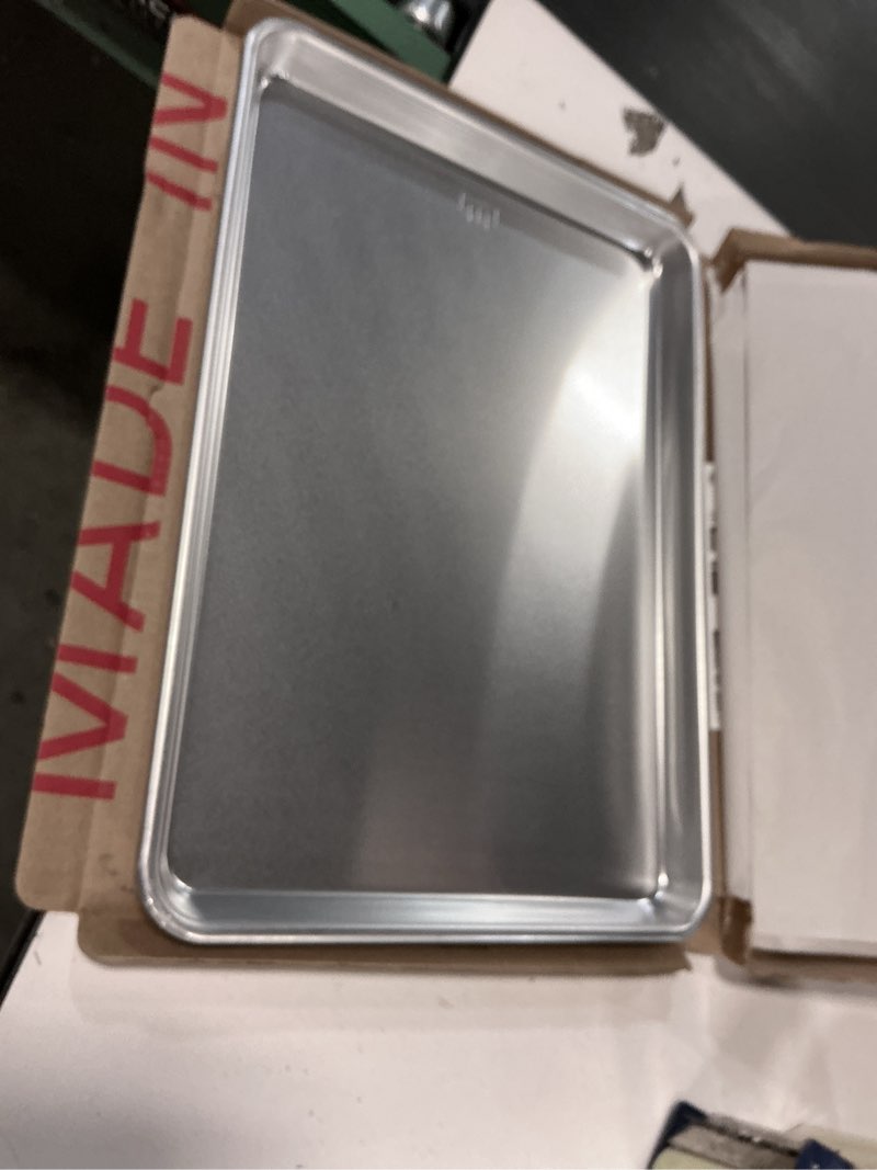 Condition photo showing Good Condition for Nordic Ware Naturals Half Sheet - USA Made Aluminum Commercial Quality Sheet Pan for Baking or Roasting, Encapsulated Galvanized Steel Rim Prevents Warping, 1-Pack