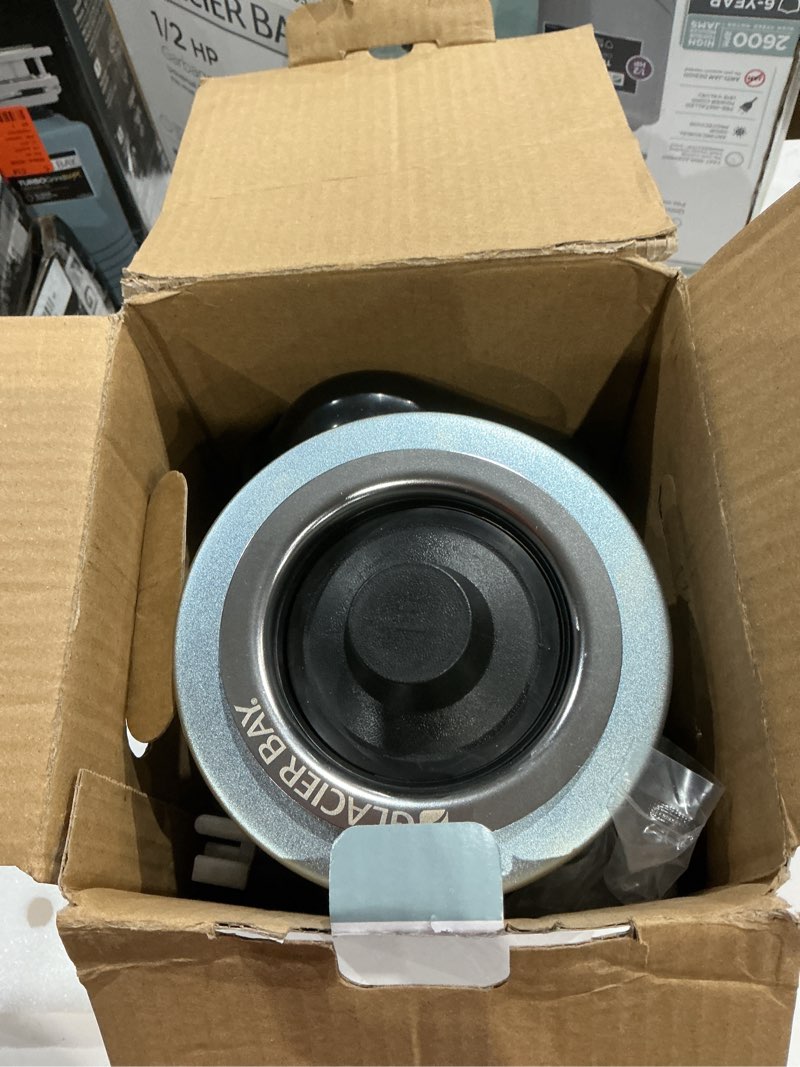 Condition photo showing As Is for turbogrind 1/2 hp. continuous feed garbage disposal with power cord