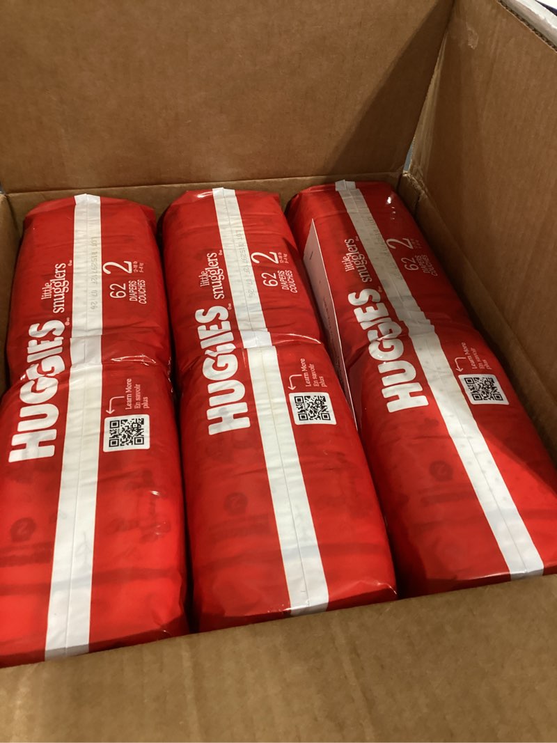 Condition photo showing New/Like New for huggies size 2 diapers, little snugglers baby diapers, size 2 (12-18 lbs), 186 count (3 packs of 62), packaging may vary