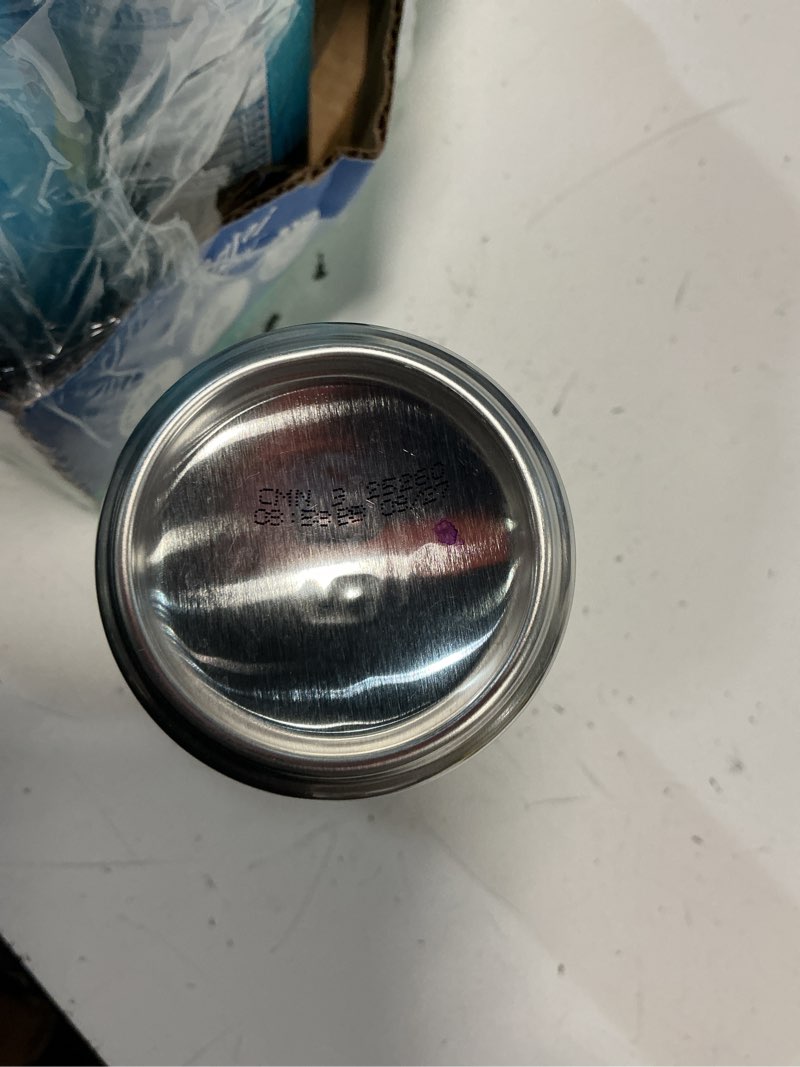Condition photo showing New/Like New for (bb :09/2027) alani nu blue slush, sugar free, low calorie energy drinks, 200mg caffeine, biotin, b vitamins, zero sugar, 10 calories, 12 fl oz cans, 24 pack blue slush 12 fl oz (pack of 24)