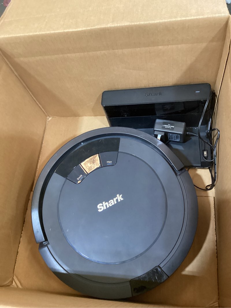 Condition photo showing As Is for shark av753 ion robot vacuum, tri-brush system, wifi connected, 120 min runtime, works with alexa, multi surface cleaning, grey