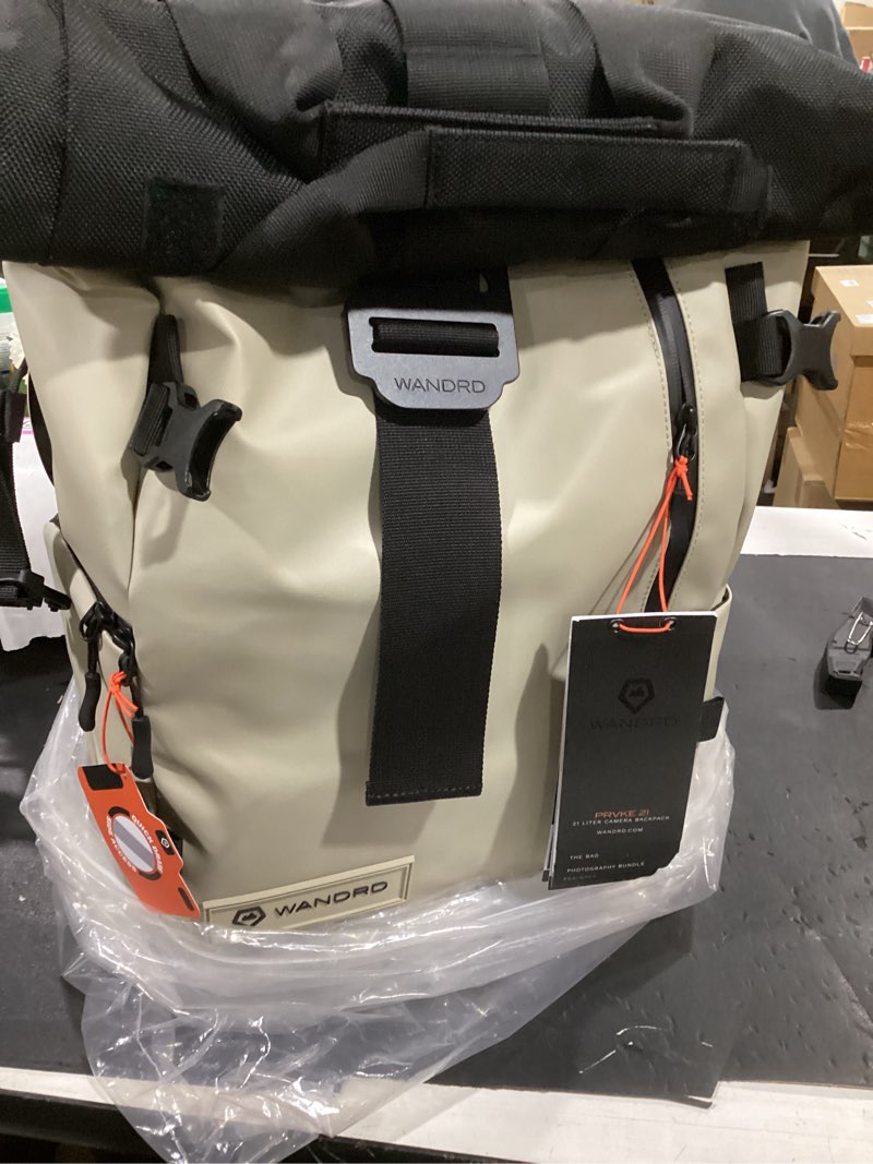 Condition photo showing New/Like New for wandrd all-new prvke 21l photography travel backpack - photo bundle, yuma tan